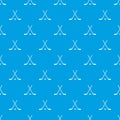 Crossed hockey sticks and puck pattern seamless blue