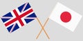 The crossed Japan and UK flags. Official colors. Vector