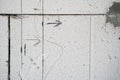 Crossed lines drawn in pencil on a bare aerated concrete wall. Designation of future walls with lines and arrows on the gas block