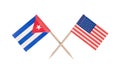 Crossed mini flag USA and Cuba Royalty Free Stock Photo