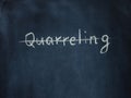 Crossed out the word Quarreling on black chalkboard