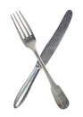 Crossed vintage crossed fork and knife isolated on bell background. Rustic style