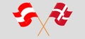Crossed and waving flags of Austria and Denmark Royalty Free Stock Photo