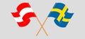 Crossed and waving flags of Austria and Sweden Royalty Free Stock Photo