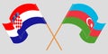 Crossed and waving flags of Azerbaijan and Croatia