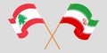 Crossed and waving flags of Iran and Lebanon