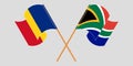 Crossed and waving flags of Romania and Republic of South Africa