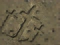 Crosses carved in the sand