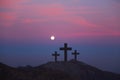 Crosses on the hill over sunset backgroun.Religious concept of c Royalty Free Stock Photo