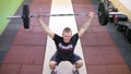 CrossFit athlete performs overhead squat exersice