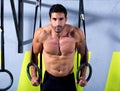 Crossfit dip ring man workout at gym