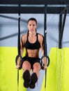 Crossfit dip ring woman workout at gym dipping