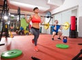 Crossfit fitness gym weight lifting bar group Royalty Free Stock Photo