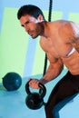 Crossfit man lifting kettlebell workout exercise Royalty Free Stock Photo