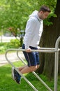 Crossfit man working out pull-ups outdoors Royalty Free Stock Photo