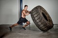 Crossfit training - man flipping tire Royalty Free Stock Photo