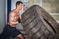 Crossfit training - man flipping tire Royalty Free Stock Photo