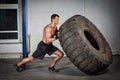 Crossfit training - man flipping tire Royalty Free Stock Photo