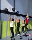 Crossfit workout people group with wall balls and rope Royalty Free Stock Photo