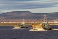 Crossing the Anadyr Estuary on barges Royalty Free Stock Photo