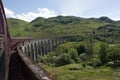 Crossing the Glenfinnan Viaduct on the Jacobite Royalty Free Stock Photo