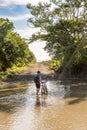 Crossing the river in Nicaragua countryside