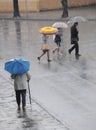 Crossing the road on a rainy day