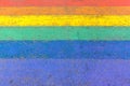 Crossing in street of LGBTQI or LGBT rainbow pride flag colors as background Royalty Free Stock Photo