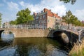 A crossing of two beautiful canals in Delft, the Netherlands.