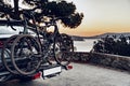 Crossover car with two road bicycles loaded on a rack Royalty Free Stock Photo