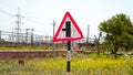 Crossroad sign on the road with attractive road sign and symbols. Right moving turn on the road with green boulevard path Royalty Free Stock Photo