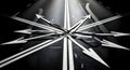 Crossroads of Decision: Multiple Arrows Pointing in Different Directions on a Dark Road Royalty Free Stock Photo