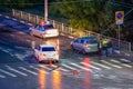 At the crossroads at night, the driver violated and knock down a pedestrian. The police draw up a road traffic accident. Police