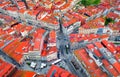 Crossroads or road junction in a European city, red roofs top view, portuguese houses and architecture