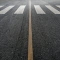 Crosswalk on asphalt road Royalty Free Stock Photo