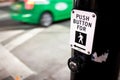Crosswalk Button and Green Taxi Royalty Free Stock Photo