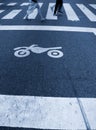 Crosswalk and motorcycle symbol