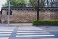 Crosswalk for pedestrians and cyclists on a busy road in the city