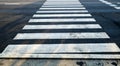 Crosswalk on the road for safety when people walking cross the street, Pedestrian crossing on a repaired asphalt road, Royalty Free Stock Photo