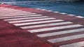 Crosswalk on the road for safety when people walking cross the street, Pedestrian crossing on a repaired asphalt road Royalty Free Stock Photo