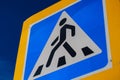 Crosswalk sign blue warning pedestrian. man