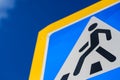 Crosswalk sign blue warning pedestrian. symbol Royalty Free Stock Photo