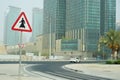 Crosswalk sign of man in thobe in Doha Qatar