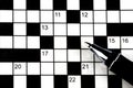 Crossword Puzzle and Roller Ball Pen Closeup