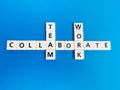 Crosswords collaborate teamwork made from square letter tiles. Royalty Free Stock Photo