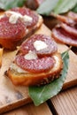 Crostini with salami Royalty Free Stock Photo