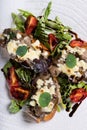 Crostini with sautÃÂ©ed forest mushrooms, garlic, basil and mozzarella.Traditional italian antipasti appetizer Royalty Free Stock Photo