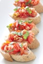 Crostini with tomato, basil and garlic