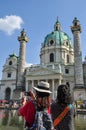 Croud of Tourists at the Karlskirche, St. Charles church in the center of Vienna