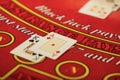 The croupier in the casino does a shuffle of cards